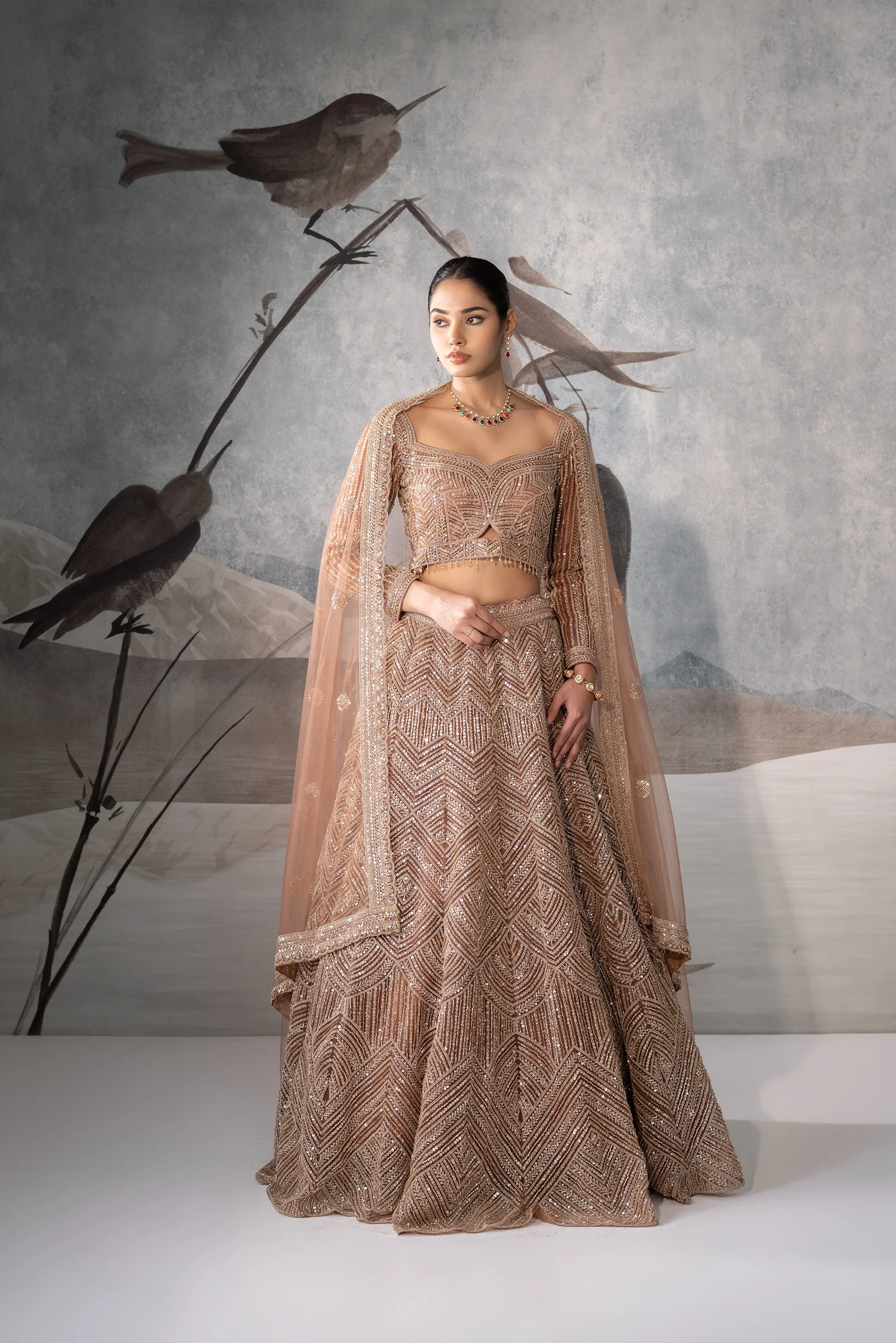 BROWN SEQUENCE EMBELLISHED LEHENGA