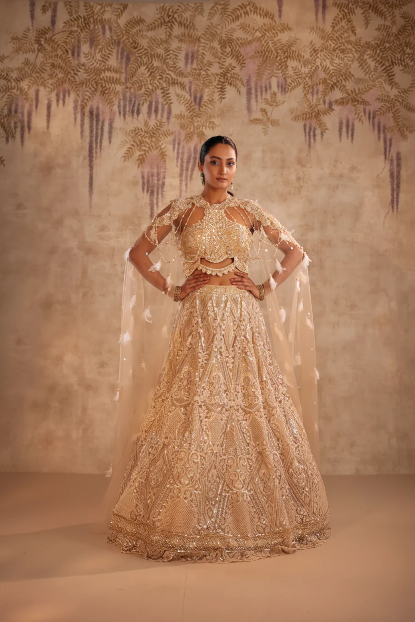 Cream Lehenga with Choker Style Cape and Embroidery