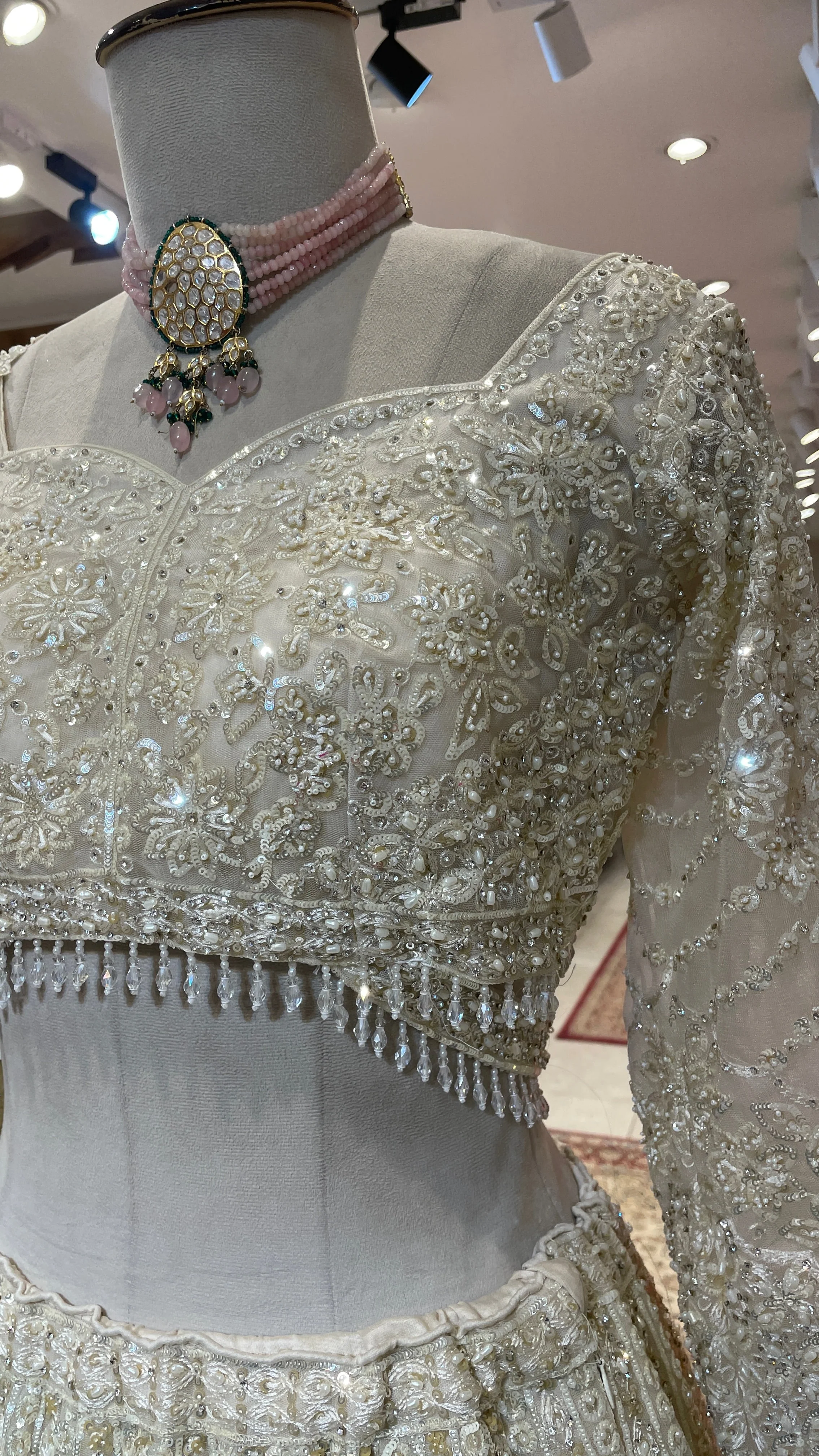 Ivory net lehenga with pearl and sequins embellishments - Image 4