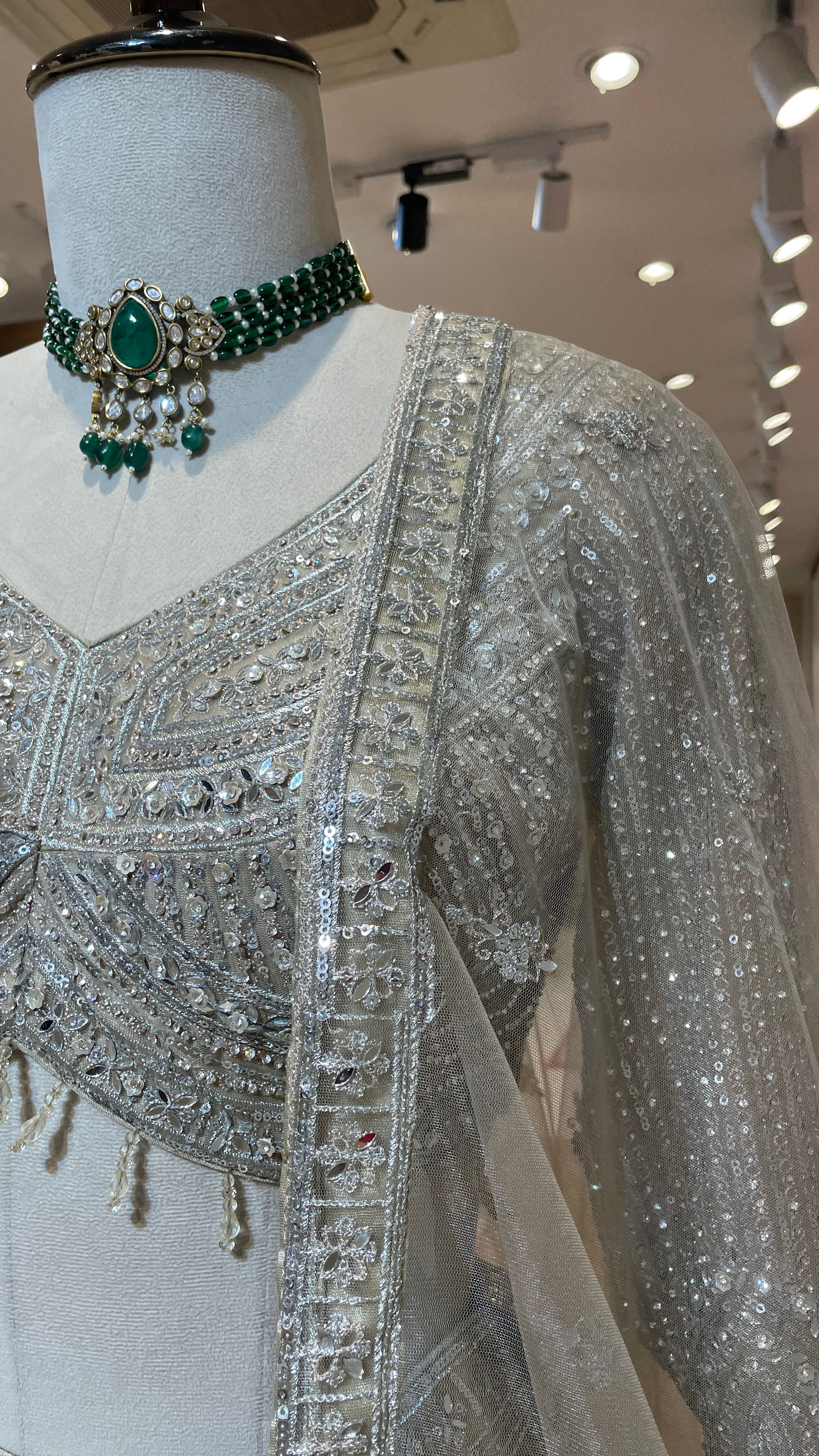 Ivory net lehenga with sequin embellishments - Image 3