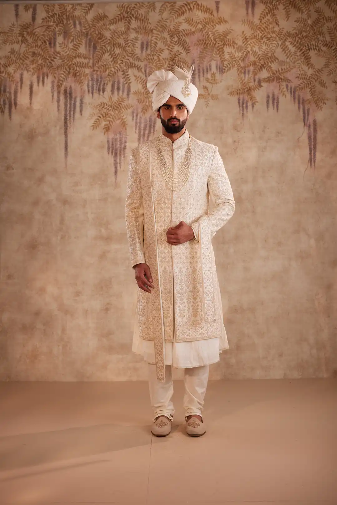 Ivory Sherwani suit with beads and zari work