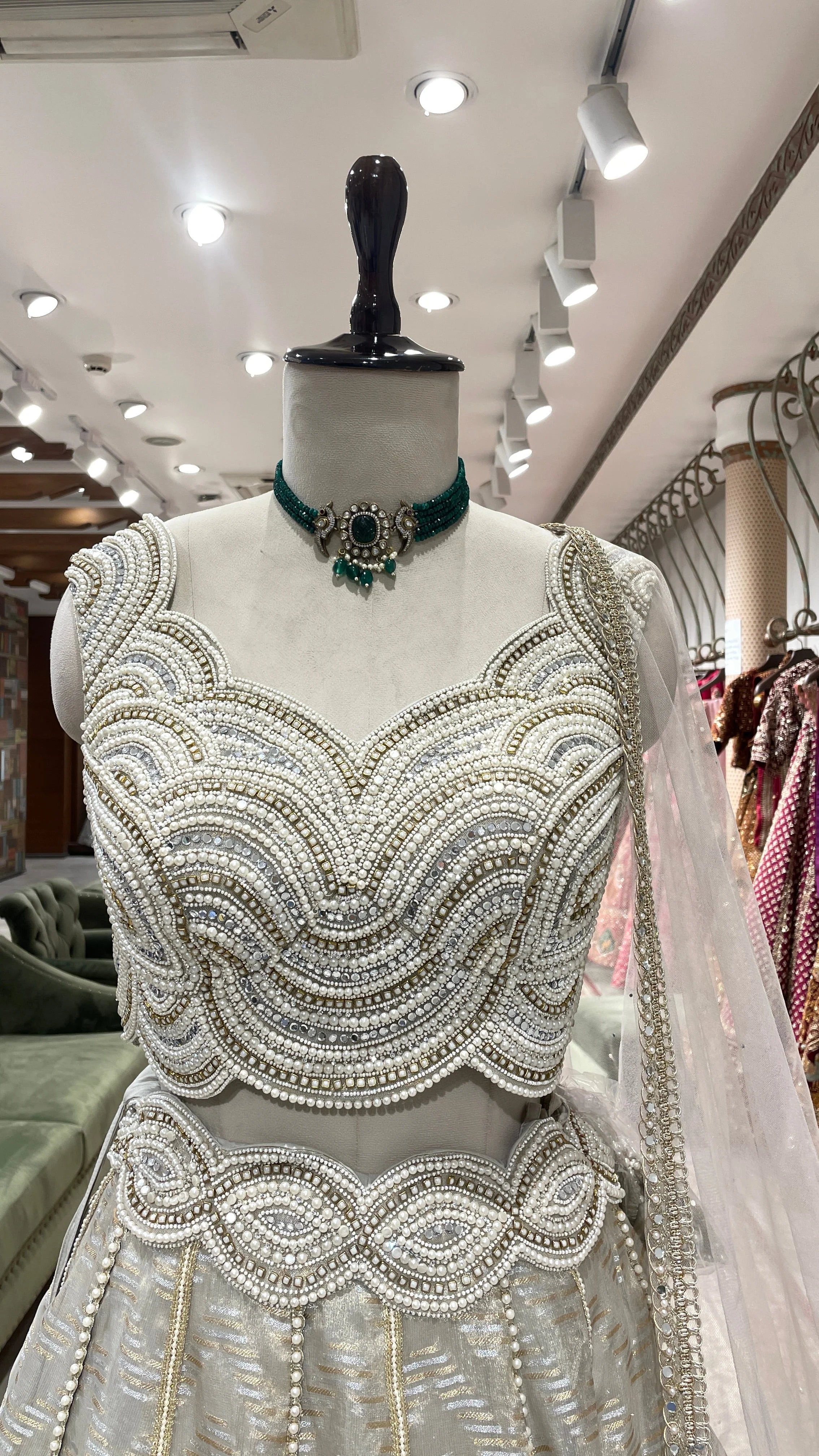 Ivory tissue lehenga with heavy embellished blouse - Image 4