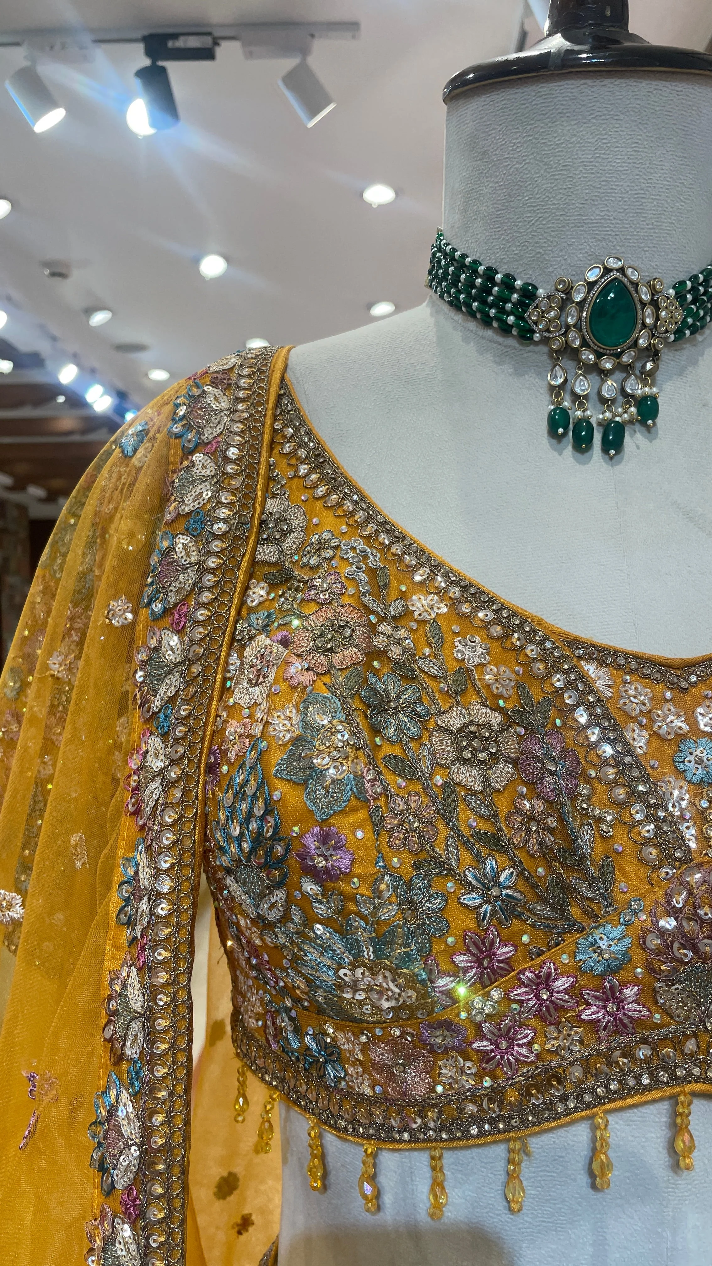 Mustard organza lehenga with floral motifs - Image 3