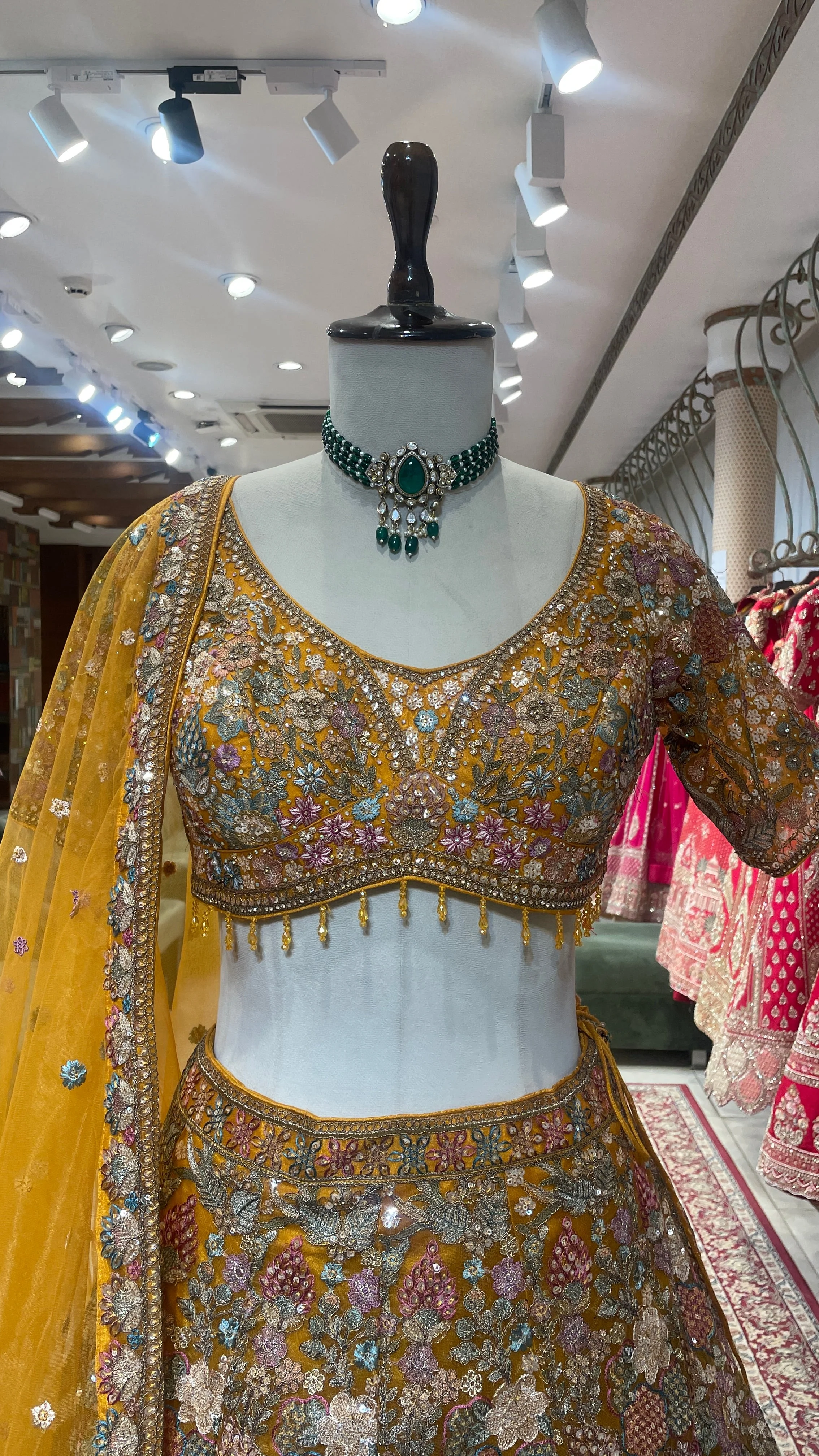 Mustard organza lehenga with floral motifs - Image 4