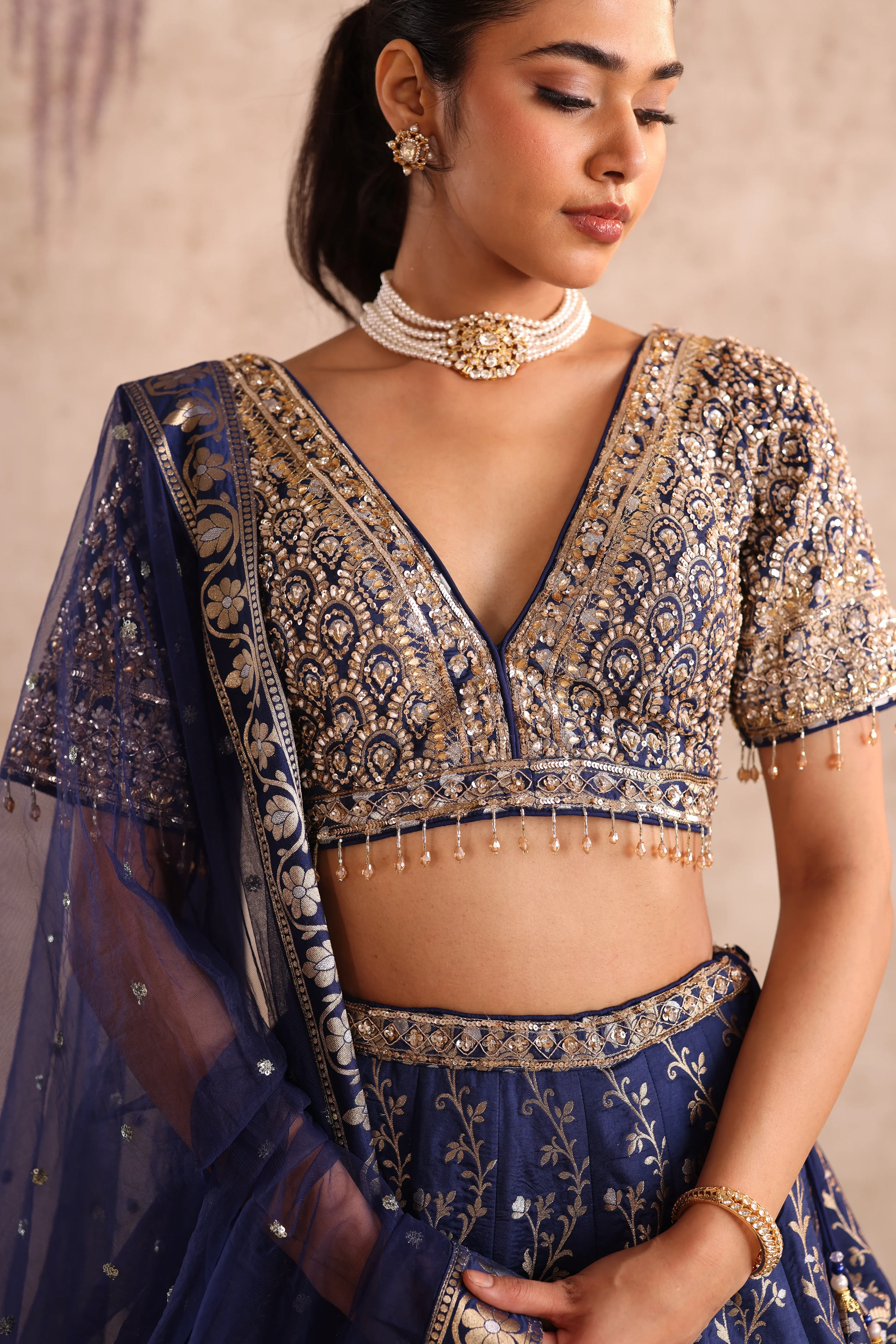 Party Wear Blue Embroidered Lehenga with Golden Choli - Image 3