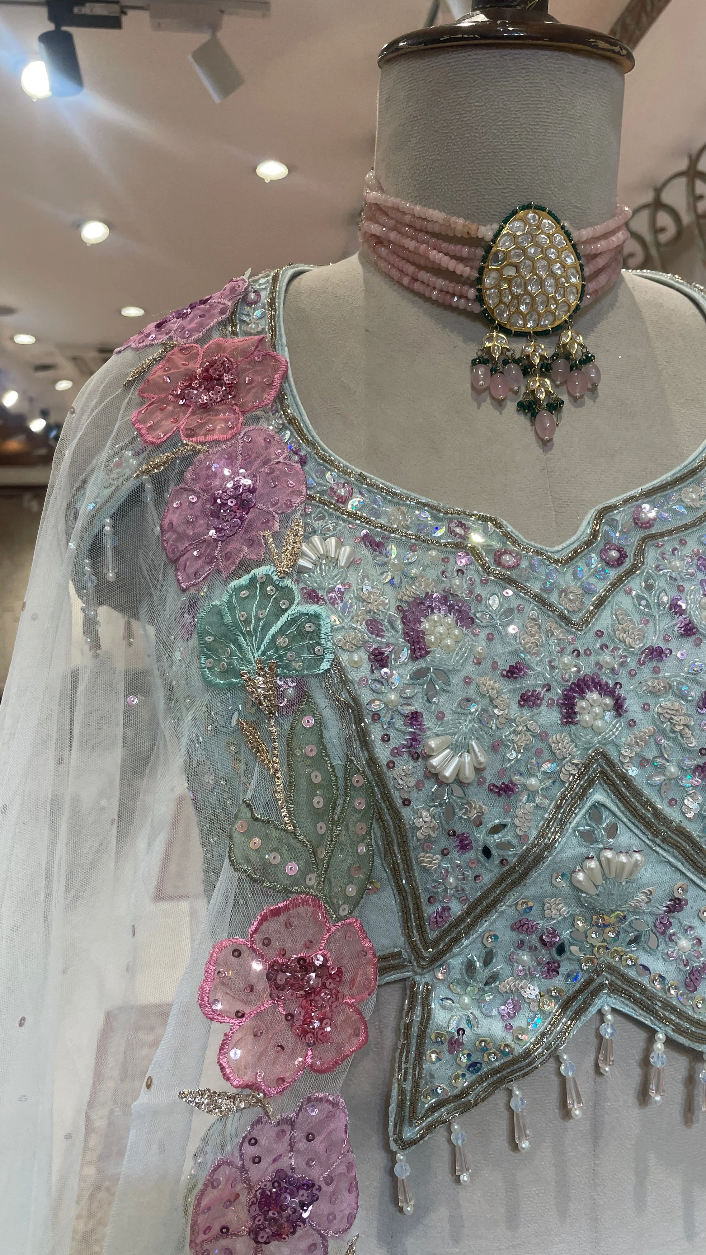 Pastel blue net lehenga with floral motifs - Image 2