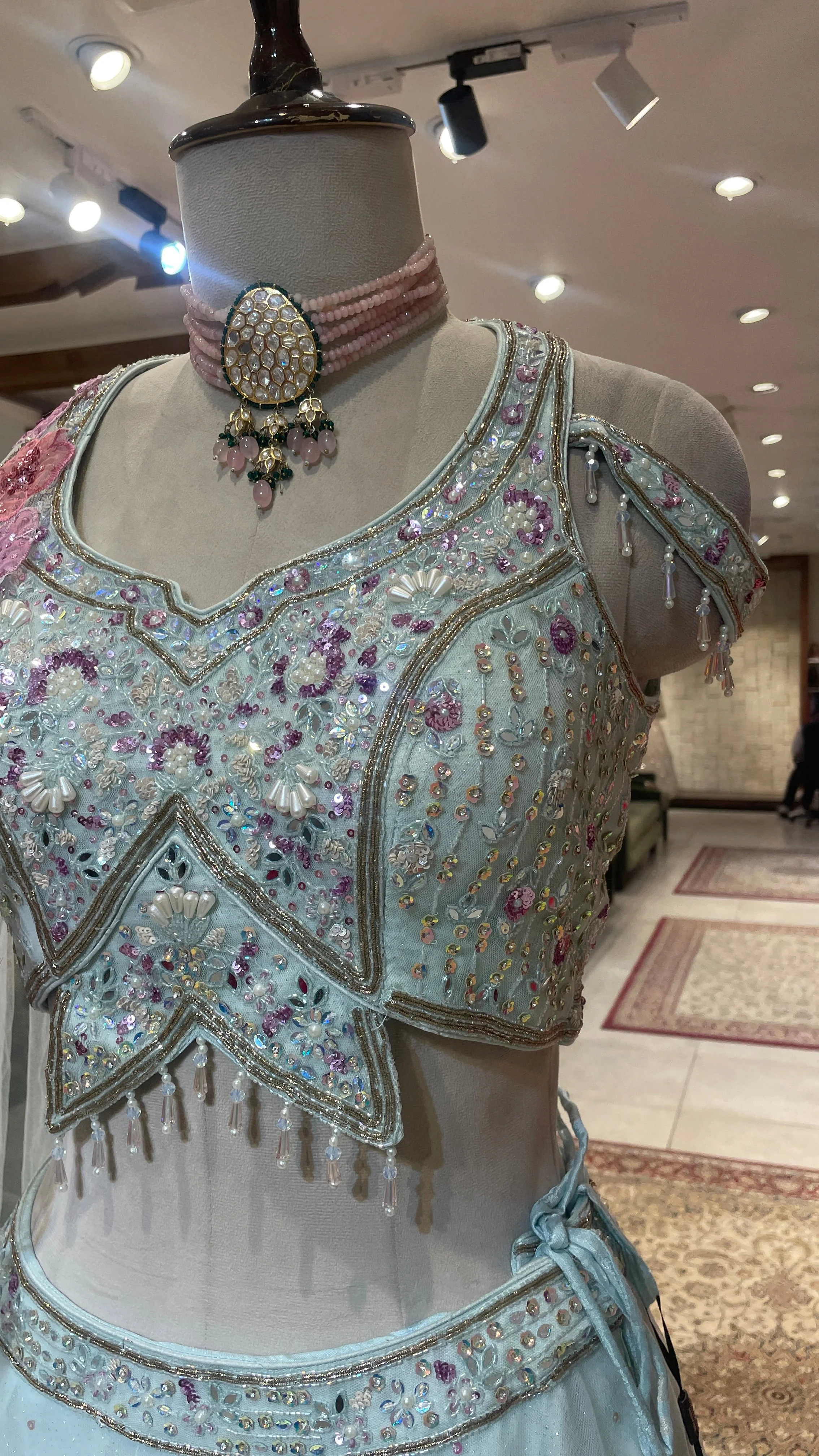 Pastel blue net lehenga with floral motifs - Image 3