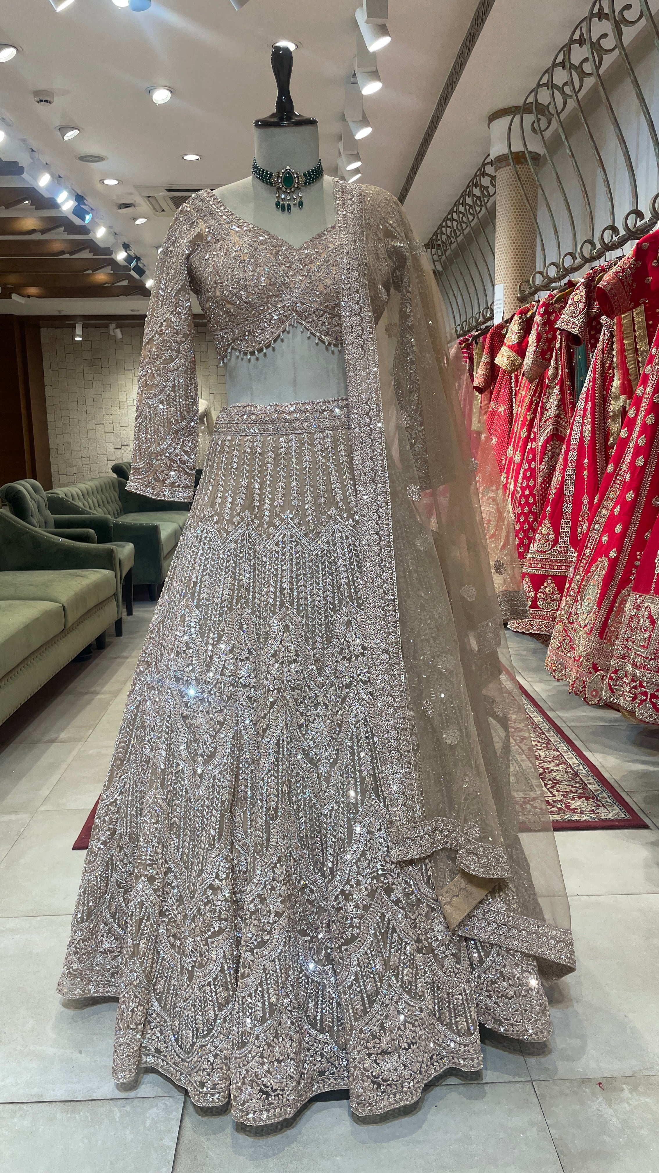 Peach net lehenga with mirrorwork & sequins