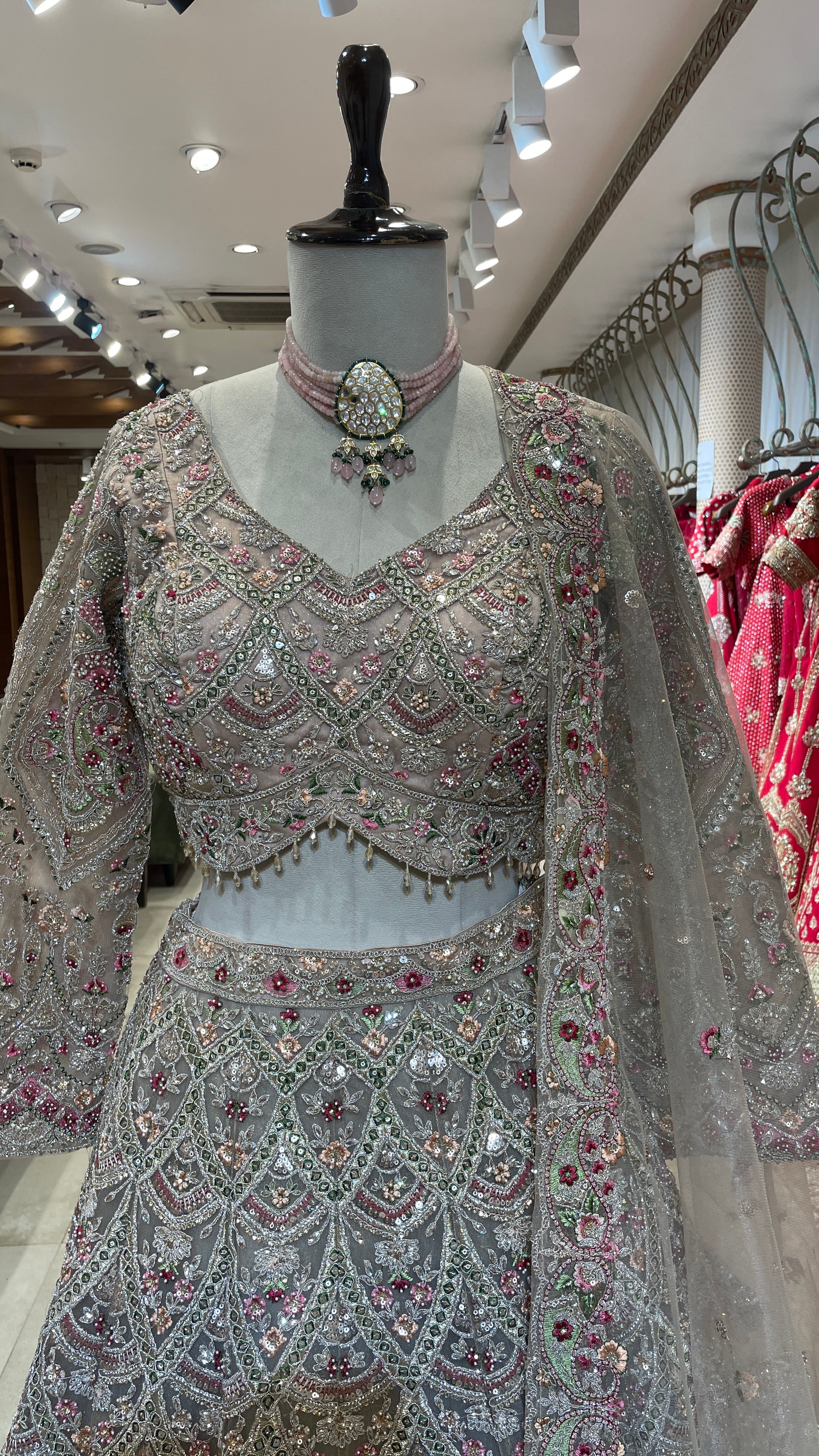 Peach net lehenga with multicolour threadwork and embellishments - Image 4