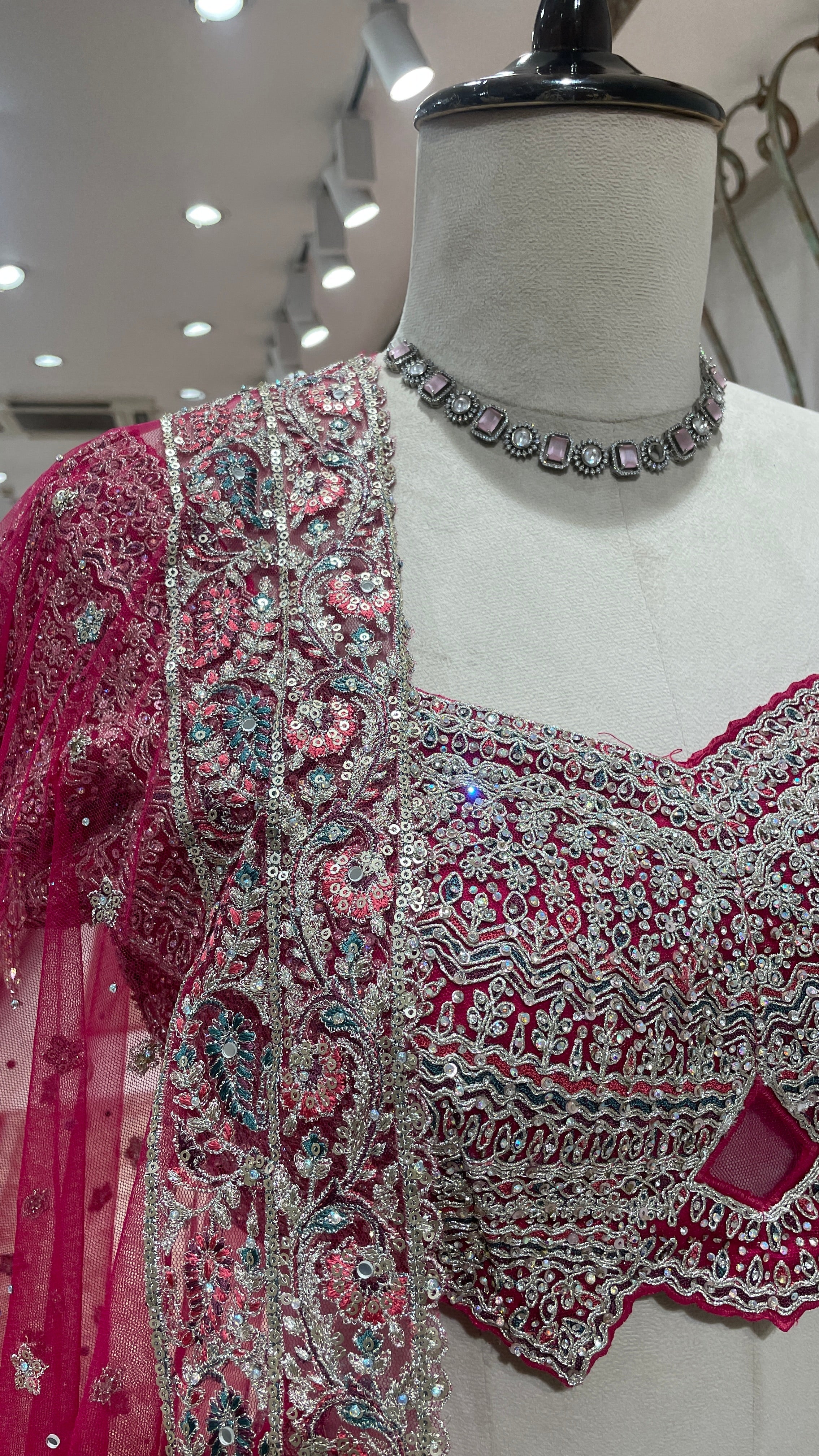 Pink net lehenga with floral motifs - Image 3