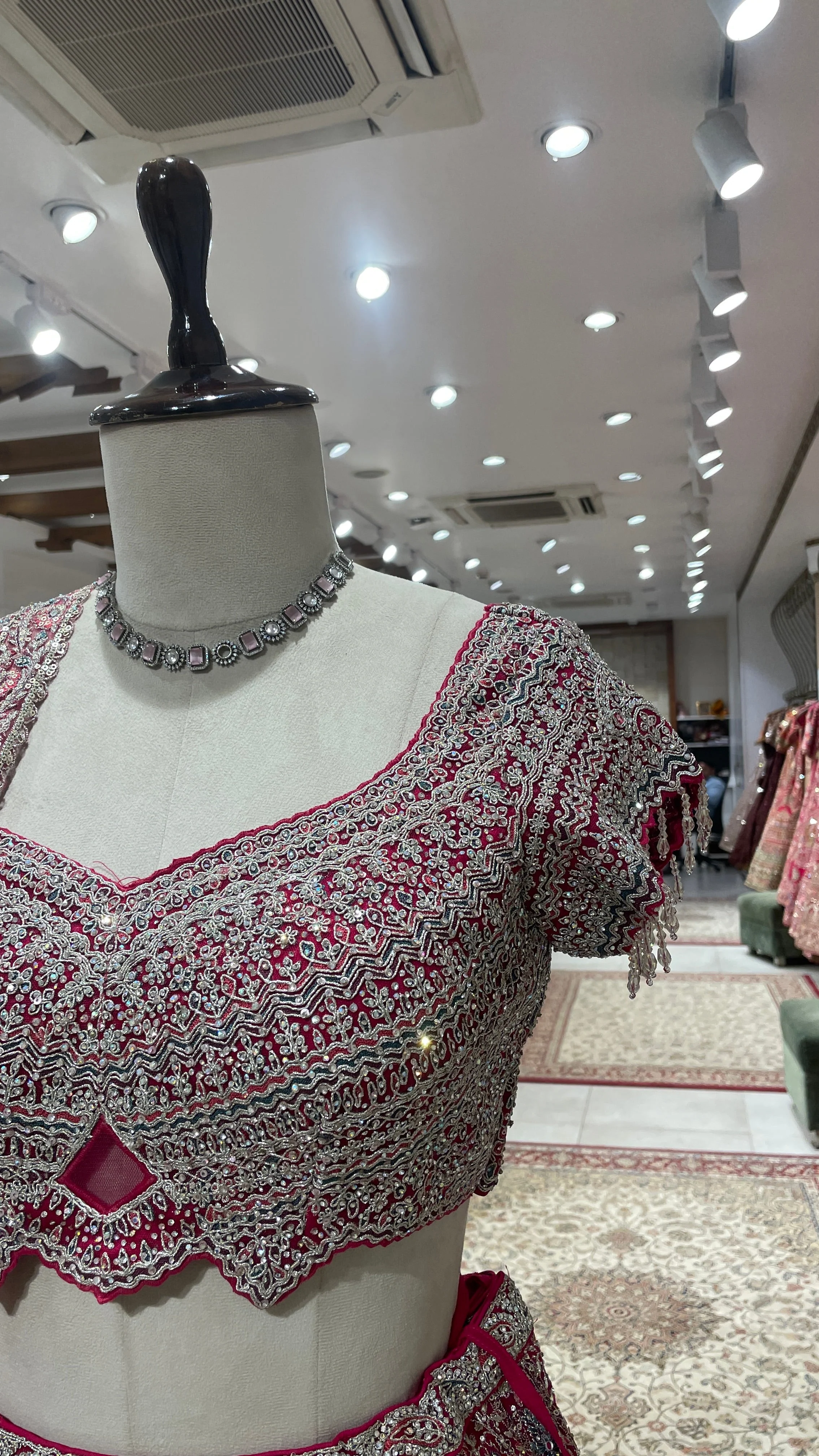 Pink net lehenga with floral motifs - Image 4