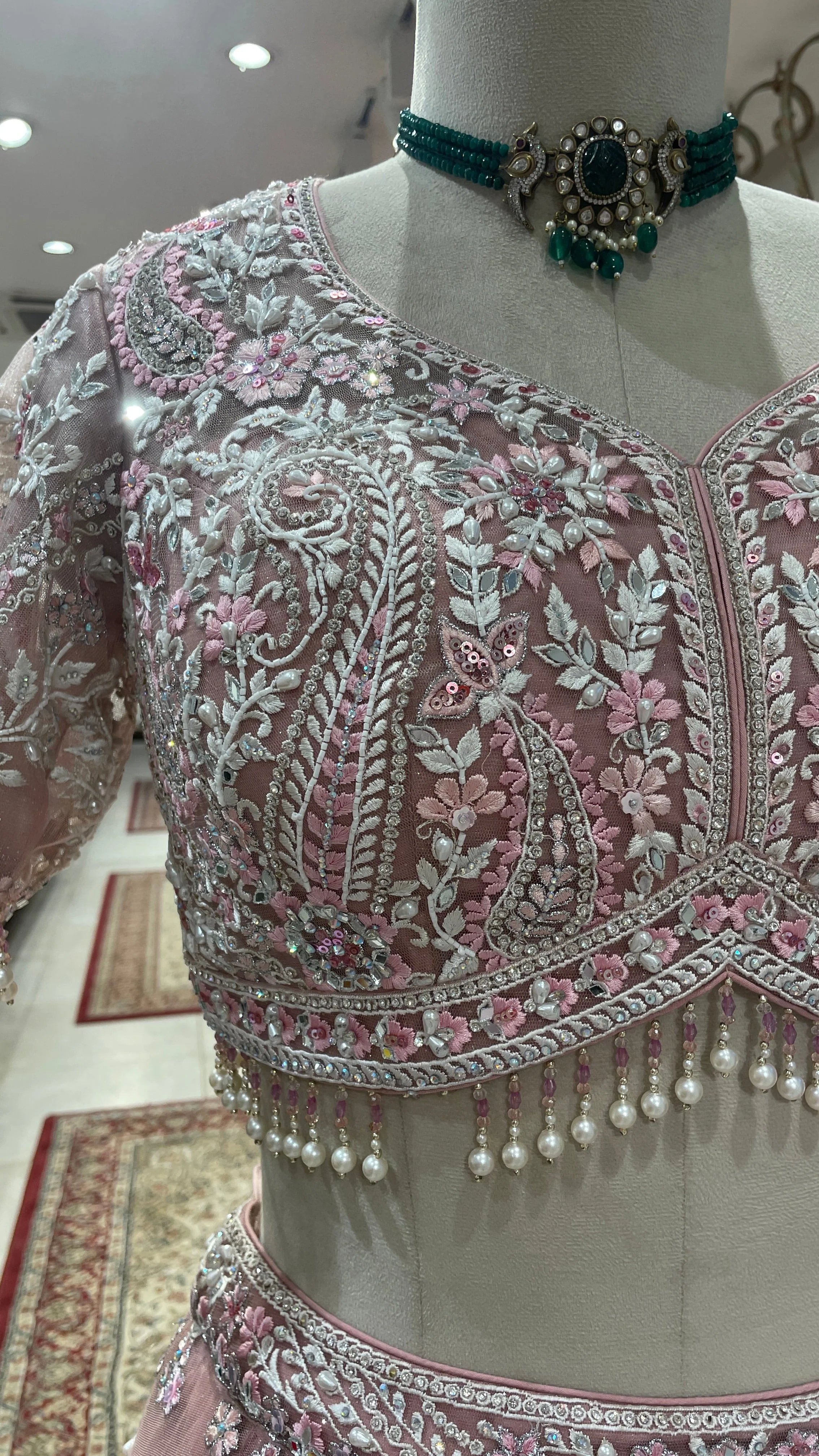 Pink net lehenga with mirrorwork and floral motifs - Image 2