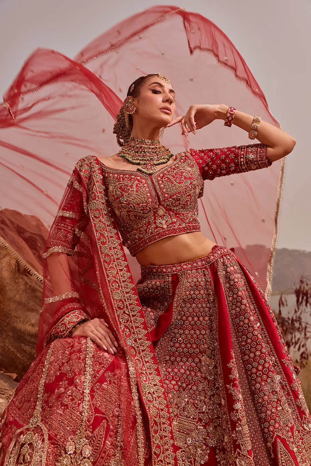 Classic red bridal lehenga with all over zari and thread work - Image 3