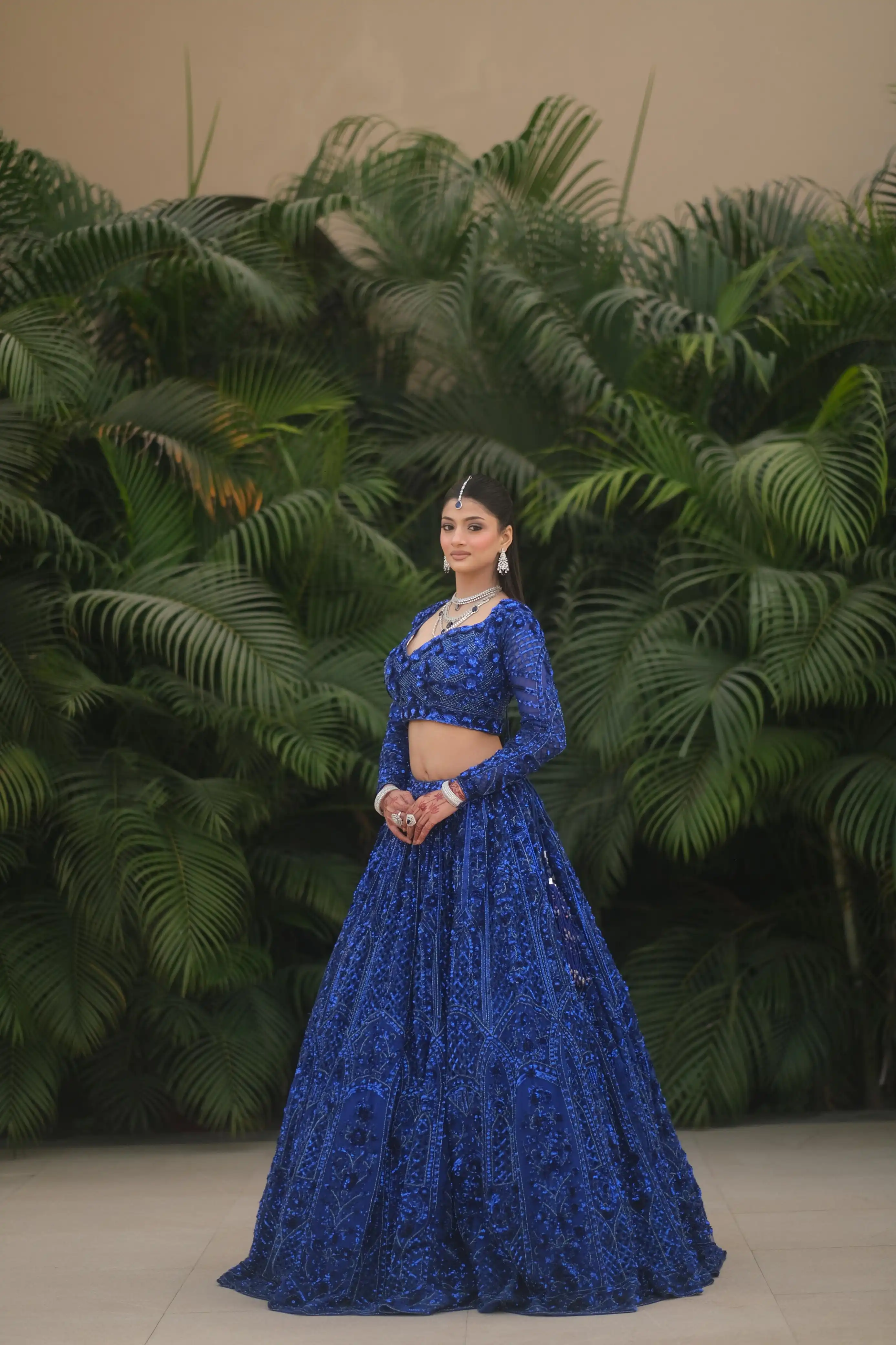 Royal blue net lehenga with floral embellishments - Image 4
