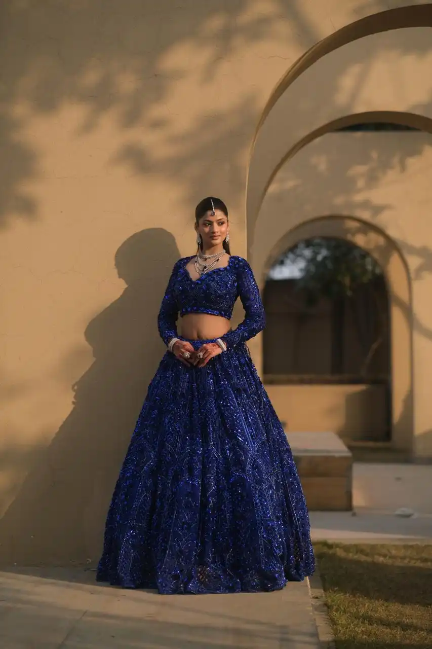 Royal blue net lehenga with floral embellishments - Image 5