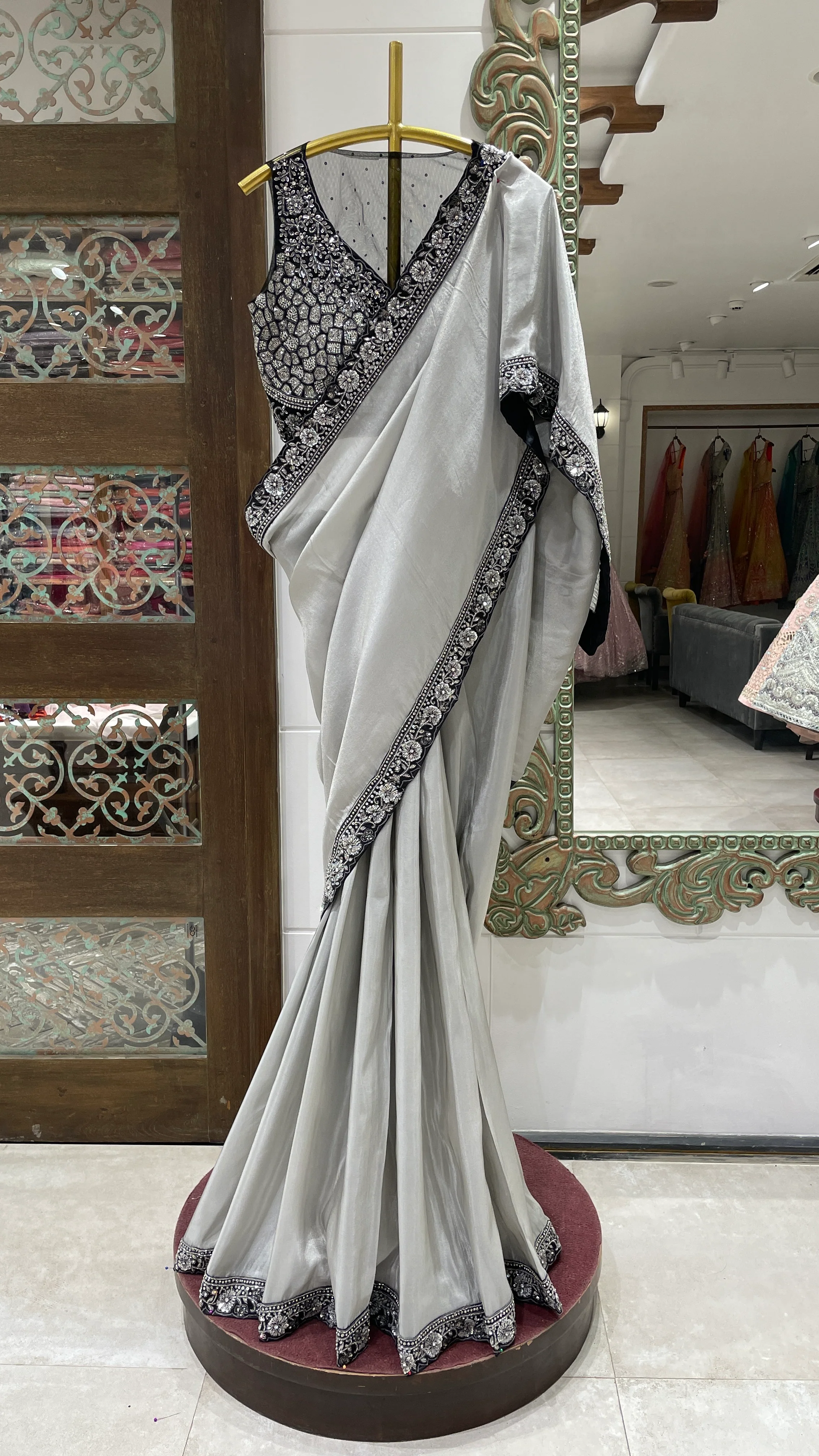 Silver tissue saree with black border