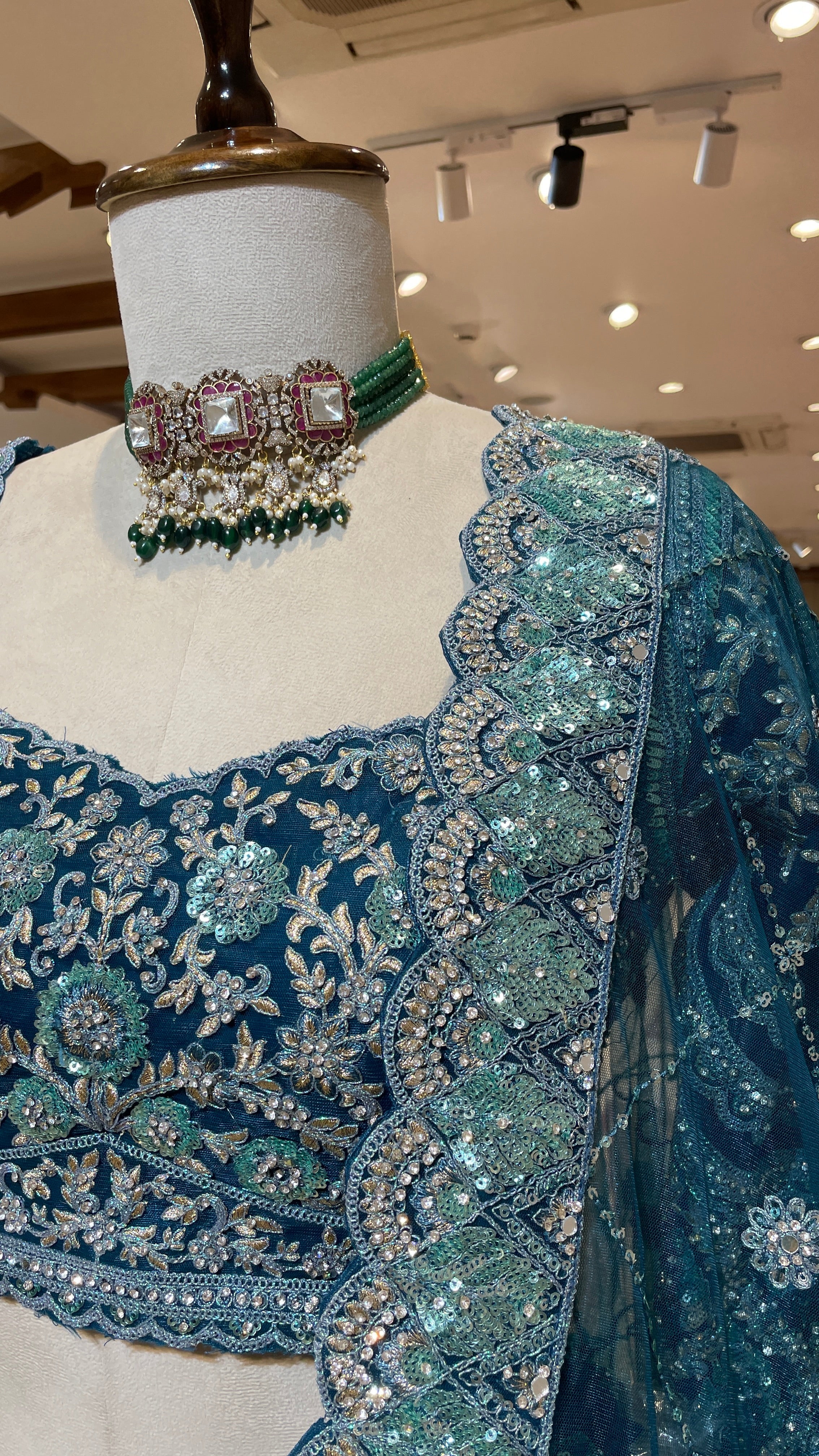 Turquoise blue lehenga with floral motifs - Image 2